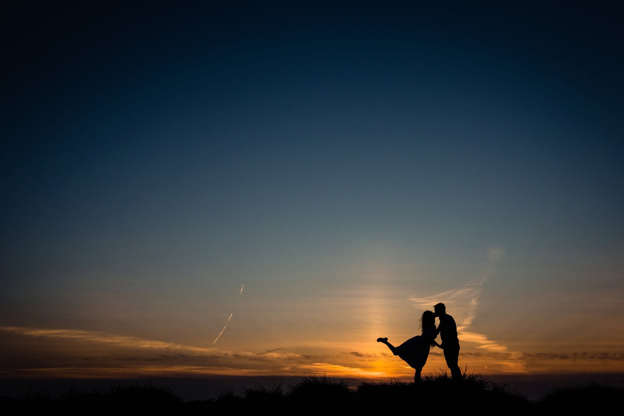Silhouette of couple on the Norfolk coast