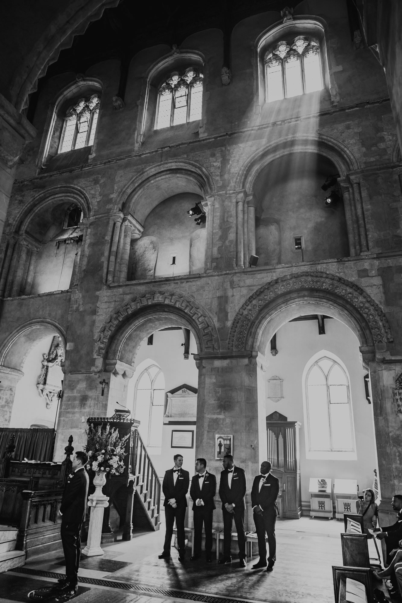 groomsmen waiting in Wymondham Abbey